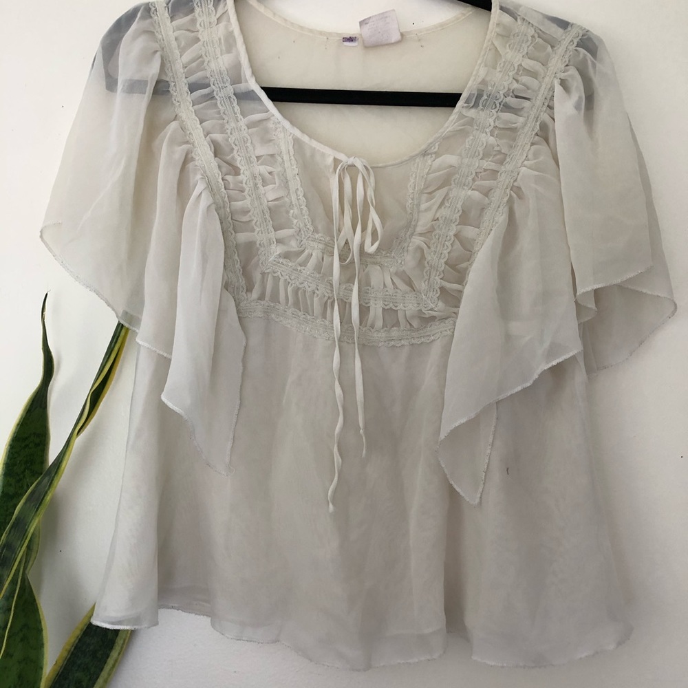 Sheet white flowy blouse